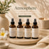 Atmosphere Collection lifestyle photo featuring luxury room and linen sprays by Nurse Calm Aromatherapy™ displayed in a warm neutral spa-inspired setting with soft lighting, botanical accents, and calming décor.