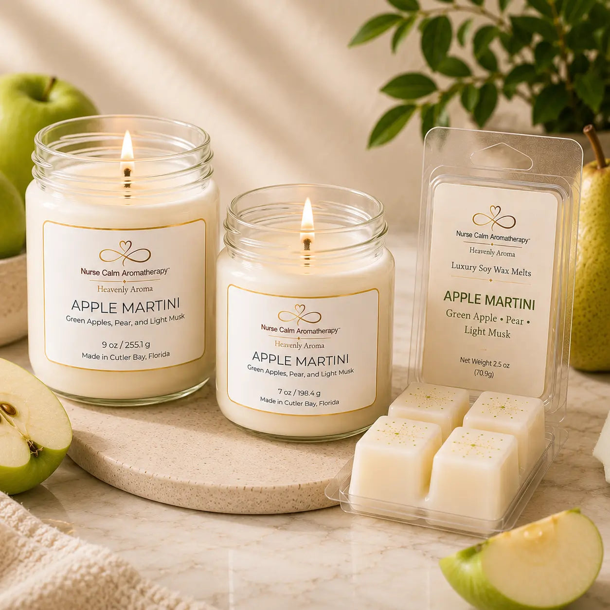 Close-up of the Apple Martini Complete Signature Collection showcasing 9 oz and 7 oz soy candles with a luxury wax melt in a premium botanical product display.
