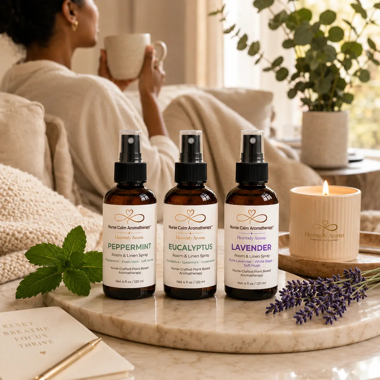 Woman enjoying a peaceful self-care moment with the Essentials Bundle of Peppermint, Eucalyptus, and Lavender Room & Linen Sprays in a warm, relaxing home environment.