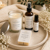 Nurse Calm Aromatherapy Heavenly Reset Box products including candle, room spray, wax melt, and essential oil roller.