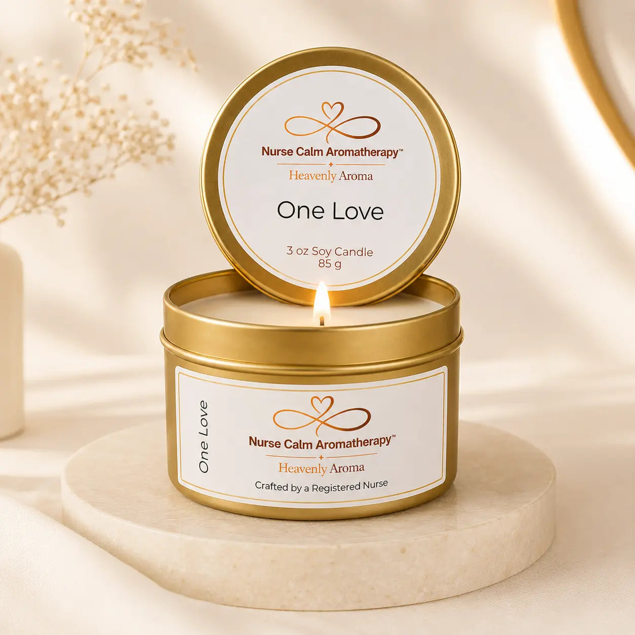 Nurse Calm Aromatherapy candle labeled 'One Love' on a neutral background