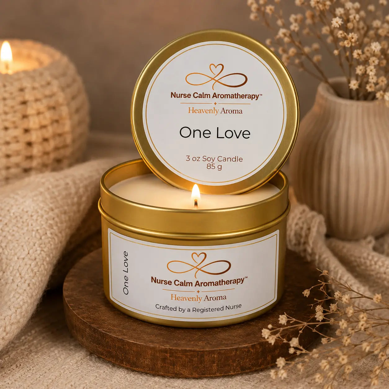 Nurse Calm Aromatherapy candle with 'One Love' label on a wooden coaster.