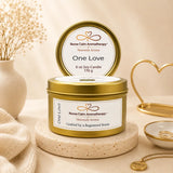 Nurse Calm Aromatherapy 'One Love' candle with gold lid on a neutral background