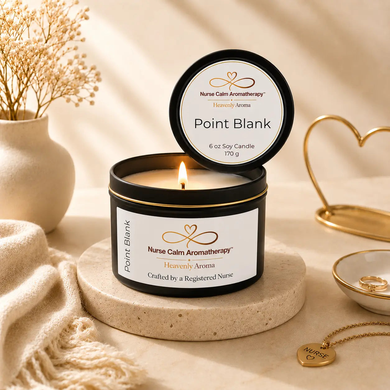 Nurse Calm Aromatherapy candle labeled 'Point Blank' on a neutral background with decorative elements.