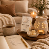 Sophisticated wellness scene featuring Point Blank Luxury Soy Wax Melts, warm lighting, cozy seating, and relaxing home décor.