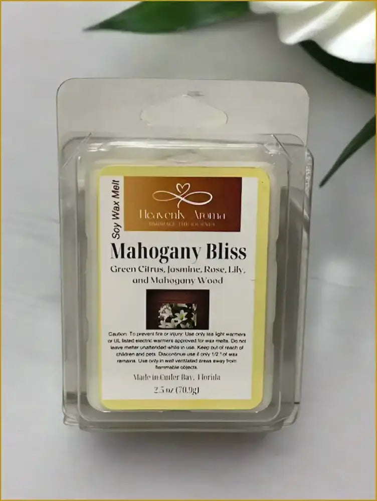 Mahogany Bliss premium soy wax melt with marine, lavender, leather, teakwood, sandalwood, jasmine, and tonka bean fragrance.